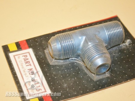 Used -12 AN T-Fitting To 3/4" Pipe On Run (7012-0073C)